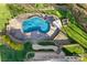 Aerial view of in-ground pool and outdoor grill area at 221 Colony Dr, Mooresville, NC 28115