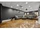 Enjoy movie nights in this theater room featuring comfortable seating, plush cushions, and a projector at 221 Colony Dr, Mooresville, NC 28115