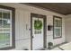 Inviting front entry of home showcasing the door's unique design and curb appeal at 306 7Th Sw St, Hickory, NC 28602