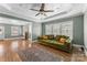 Welcoming living area with hardwood floors, comfortable seating, and a view into kitchen at 306 7Th Sw St, Hickory, NC 28602