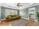 Comfortable living room showcasing stylish seating, hardwood floors, and a view into kitchen at 306 7Th Sw St, Hickory, NC 28602