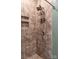 Tiled shower features multi-setting shower head, soap caddy, and built-in shelves at 306 7Th Sw St, Hickory, NC 28602