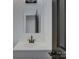 Modern bathroom featuring a new vanity, mirror, and brushed gold hardware at 4427 Gaynelle Dr, Charlotte, NC 28215