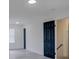 Bright bedroom featuring dark doors and modern lighting at 4427 Gaynelle Dr, Charlotte, NC 28215