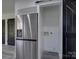 Kitchen with stainless steel refrigerator and an open doorway at 4427 Gaynelle Dr, Charlotte, NC 28215