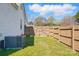 Fenced backyard offering privacy and a safe space for outdoor activities at 48 Mandalay Sw Pl, Concord, NC 28027