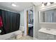 Bathroom with tiled floors and a view into adjacent bedroom at 48 Mandalay Sw Pl, Concord, NC 28027