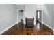 Inviting dining area with hardwood floors and table, perfect for Gathering gatherings at 48 Mandalay Sw Pl, Concord, NC 28027