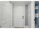 Hallway featuring a door and an open shelving unit at 48 Mandalay Sw Pl, Concord, NC 28027
