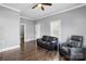 Inviting living room with plenty of natural light, hardwood floors, and updated paint and trim at 48 Mandalay Sw Pl, Concord, NC 28027