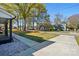 Charming street view showing well-manicured lawns and mature trees at 48 Mandalay Sw Pl, Concord, NC 28027