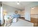 Cozy Bedroom showcasing a comfortable chair, area rug, and wooden floors at 4912 Kenbury Ct, Fort Mill, SC 29708