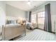 Shared bedroom featuring hardwood flooring, twin beds and neutral decor at 4912 Kenbury Ct, Fort Mill, SC 29708