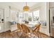 Bright dining area featuring a large table, wicker chairs, and window seating at 4912 Kenbury Ct, Fort Mill, SC 29708