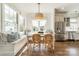 Charming dining area features a built-in bench, wicker chairs, and lots of natural light at 4912 Kenbury Ct, Fort Mill, SC 29708
