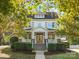 Charming two-story home with a welcoming front porch and beautifully landscaped yard at 4912 Kenbury Ct, Fort Mill, SC 29708
