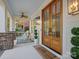 Welcoming front porch featuring elegant lighting and comfortable seating at 4912 Kenbury Ct, Fort Mill, SC 29708