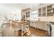 Bright kitchen with an island, stainless appliances, and a dining nook at 4912 Kenbury Ct, Fort Mill, SC 29708