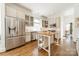 Modern kitchen with an island, stainless steel appliances, and ample cabinet space at 4912 Kenbury Ct, Fort Mill, SC 29708
