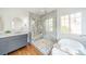 Beautiful main bathroom with marble shower, soaking tub, and custom vanity at 4912 Kenbury Ct, Fort Mill, SC 29708