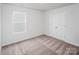 Comfortable bedroom featuring a window and a double door closet at 502 Maddox Dr, Shelby, NC 28152