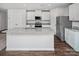Bright kitchen with stainless steel appliances, granite countertops, and a center island at 502 Maddox Dr, Shelby, NC 28152