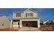 Two story home featuring an attached garage and windows with black shutters at 507 Maddox Dr, Shelby, NC 28152