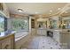 Bright bathroom with a soaking tub, a large window, and vanity with great lighting at 525 Lake Lynn Rd, Concord, NC 28025