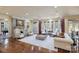 Elegant living room boasts hardwood floors, fireplace, and lots of natural light at 525 Lake Lynn Rd, Concord, NC 28025