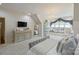 Bright bedroom features a large window seat and an elegant chandelier, and is freshly painted at 525 Lake Lynn Rd, Concord, NC 28025