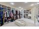 Organized walk-in closet featuring custom shelving and ample storage space for clothes and shoes at 525 Lake Lynn Rd, Concord, NC 28025