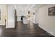 Bright kitchen with island, granite countertops, stainless appliances, and abundant storage at 703 Rankin Ave, Mount Holly, NC 28120
