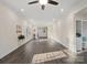 An expansive living room with recessed lighting, built-ins, and new flooring creating a welcoming atmosphere at 703 Rankin Ave, Mount Holly, NC 28120