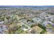 Aerial view of townhomes near a lake with abundant trees in the neighborhood at 71 40Th Avenue Ne Dr # 7, Hickory, NC 28601