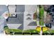 Aerial view showcases backyard patio with outdoor seating and green lawn at 71 40Th Avenue Ne Dr # 7, Hickory, NC 28601