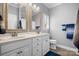 Bright bathroom with double sinks, white cabinetry, and natural light at 71 40Th Avenue Ne Dr # 7, Hickory, NC 28601