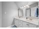 The bathroom has dual sinks, white cabinetry, and modern fixtures for a clean design at 71 40Th Avenue Ne Dr # 7, Hickory, NC 28601