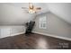 Bedroom with a ceiling fan, hardwood flooring, and a window with natural light at 71 40Th Avenue Ne Dr # 7, Hickory, NC 28601