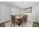 Dining room with a large wooden table and modern light fixture, ideal for gatherings at 71 40Th Avenue Ne Dr # 7, Hickory, NC 28601