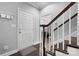 Welcoming entryway with dark wood floors and staircase leading to the upper level at 71 40Th Avenue Ne Dr # 7, Hickory, NC 28601