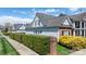 Exterior home view with manicured green hedges along the sidewalk, offering a private feel at 71 40Th Avenue Ne Dr # 7, Hickory, NC 28601
