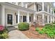 Charming home exterior featuring a well-manicured front yard and welcoming porch with classic white columns at 71 40Th Avenue Ne Dr # 7, Hickory, NC 28601