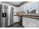 Spacious kitchen boasts stainless steel appliances, dark wood floors, and a view from the window at 71 40Th Avenue Ne Dr # 7, Hickory, NC 28601