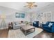 Bright living room featuring a cozy sofa and stylish decor for a comfortable living space at 71 40Th Avenue Ne Dr # 7, Hickory, NC 28601