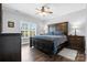 Spacious main bedroom with wood floors, a ceiling fan, and natural light at 71 40Th Avenue Ne Dr # 7, Hickory, NC 28601
