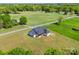Aerial view of modern farmhouse on large, grassy lot at 7419 Tesh Rd, Monroe, NC 28110