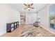 Inviting bedroom featuring neutral colors, a ceiling fan, a cozy armchair, and ample natural light at 7419 Tesh Rd, Monroe, NC 28110