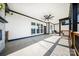 Spacious covered patio, wood trim, ceiling fan, and offers great space for entertaining at 7419 Tesh Rd, Monroe, NC 28110