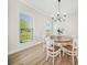 Bright dining room with natural light and a round table perfect for Gathering gatherings at 7419 Tesh Rd, Monroe, NC 28110