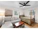 A bedroom with a sofa and four-poster bed at 801 Glendora Dr, Charlotte, NC 28212